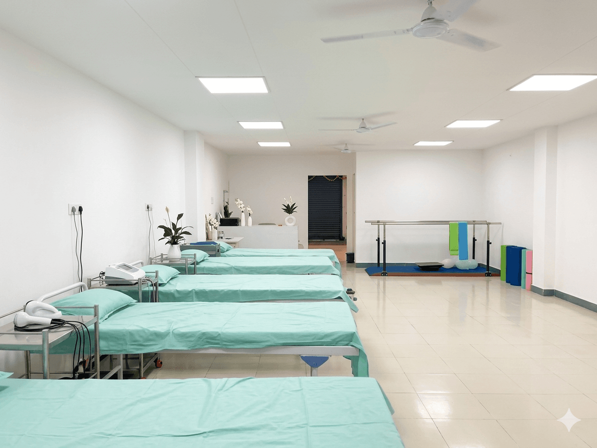 Spacious clinic with treatment beds and parallel bars