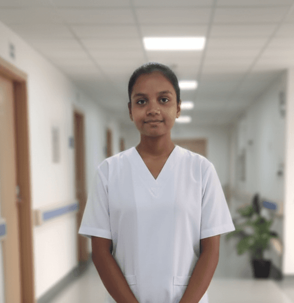 Medical professional in white uniform